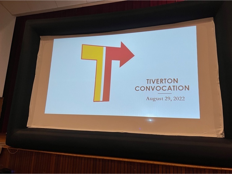projector screen with Tiverton Public Schools Logo 